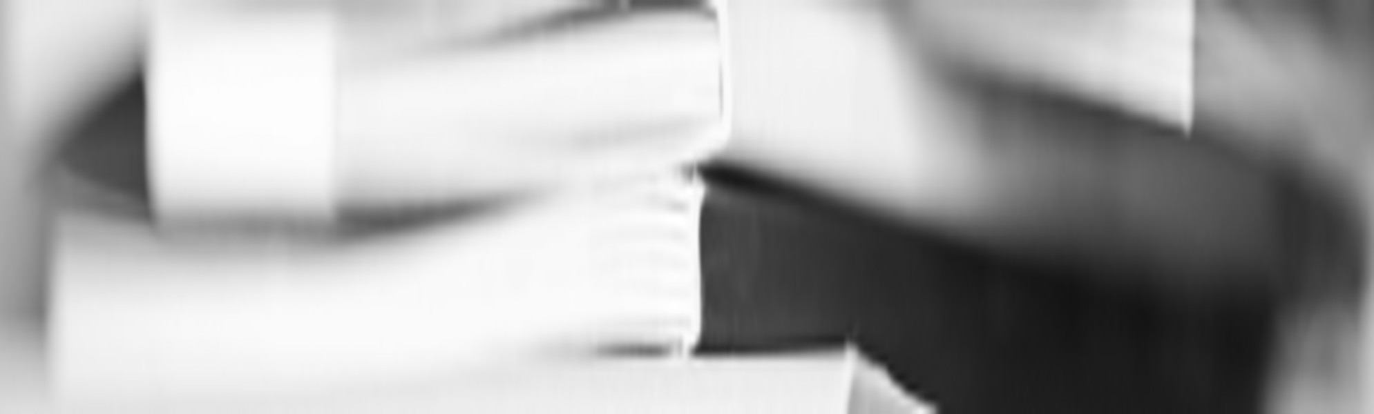 Libri e cataloghi aperti, immagine hero della pagina servizi SPOT